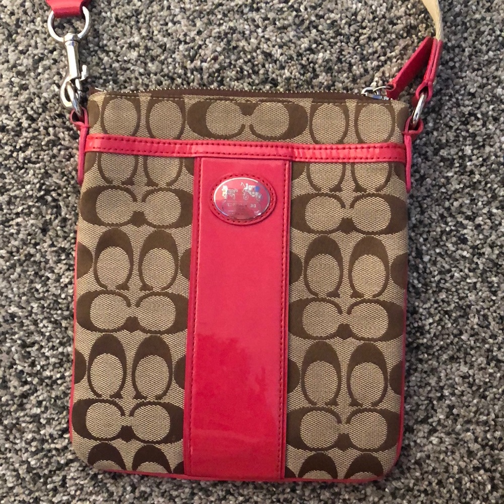 Coach Crossbody purse with hot pink accents